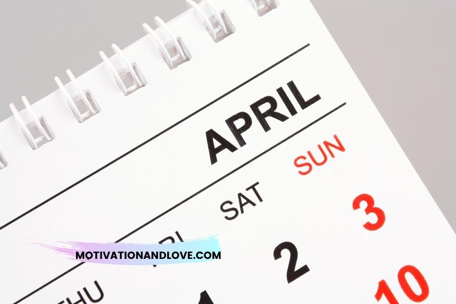 Close up of an April calendar with white spiral binding at top, showing the 2nd and 3rd days of the month in red.